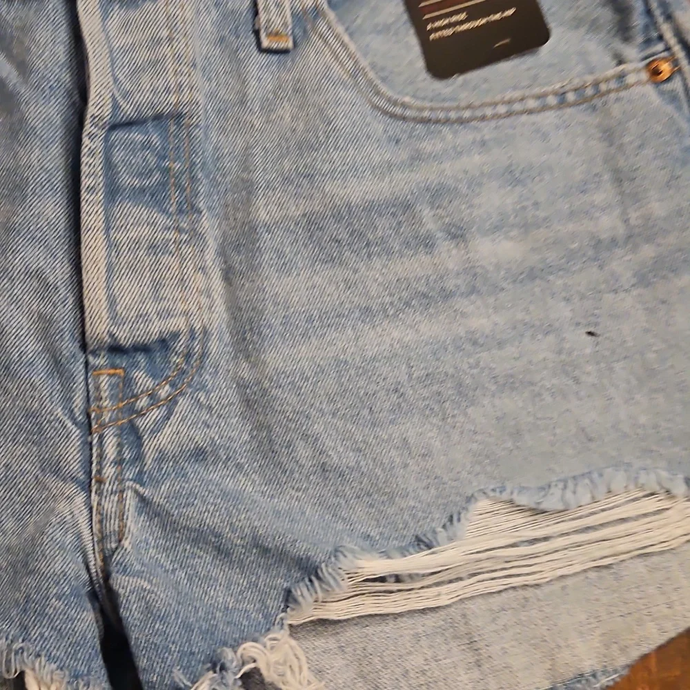 Levi's Light Blue Frayed Denim Cutoff Shorts Size 31 High Rise